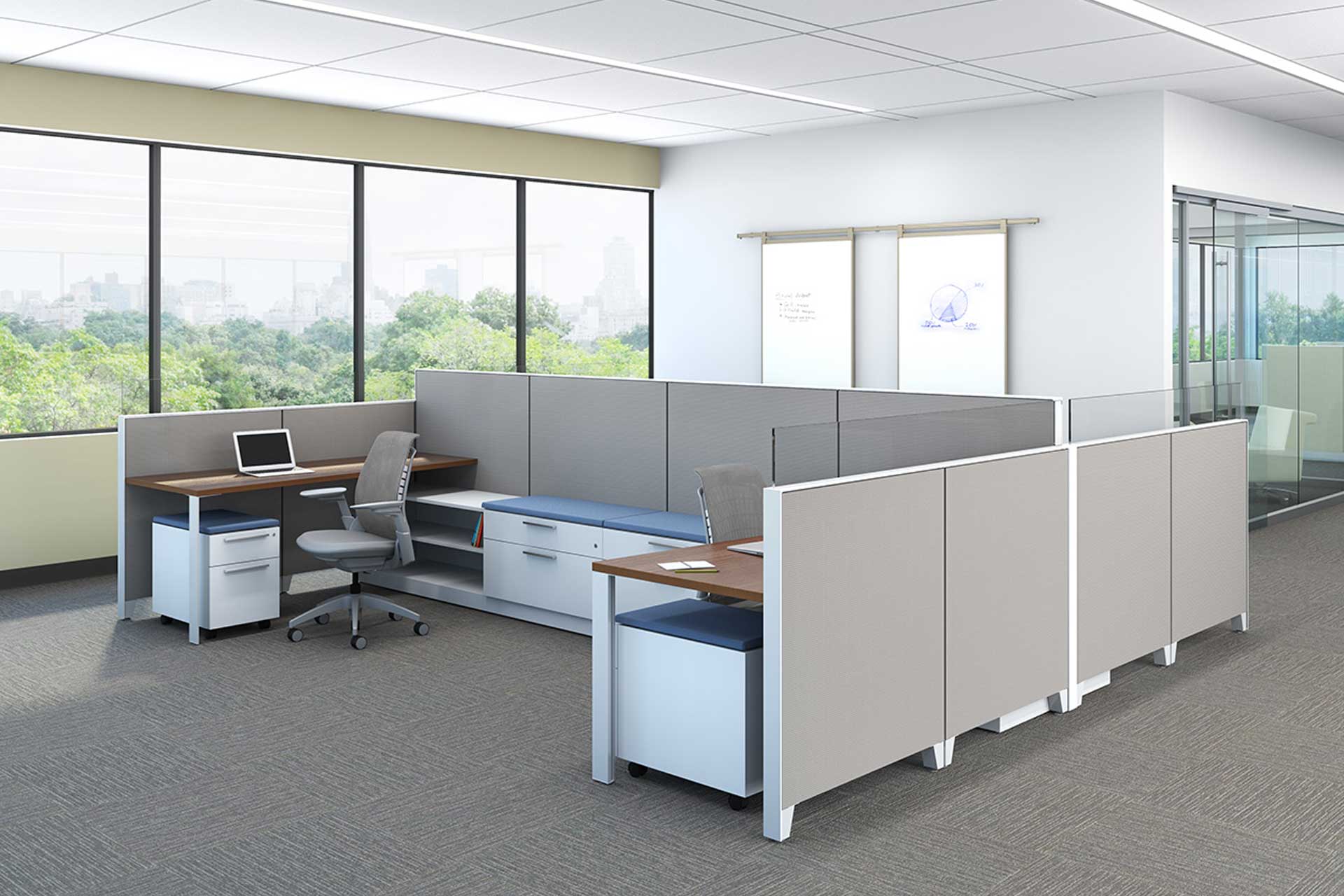 Interior view of office furniture showing cubicle walls, two chairs, cabinets, and wide windows