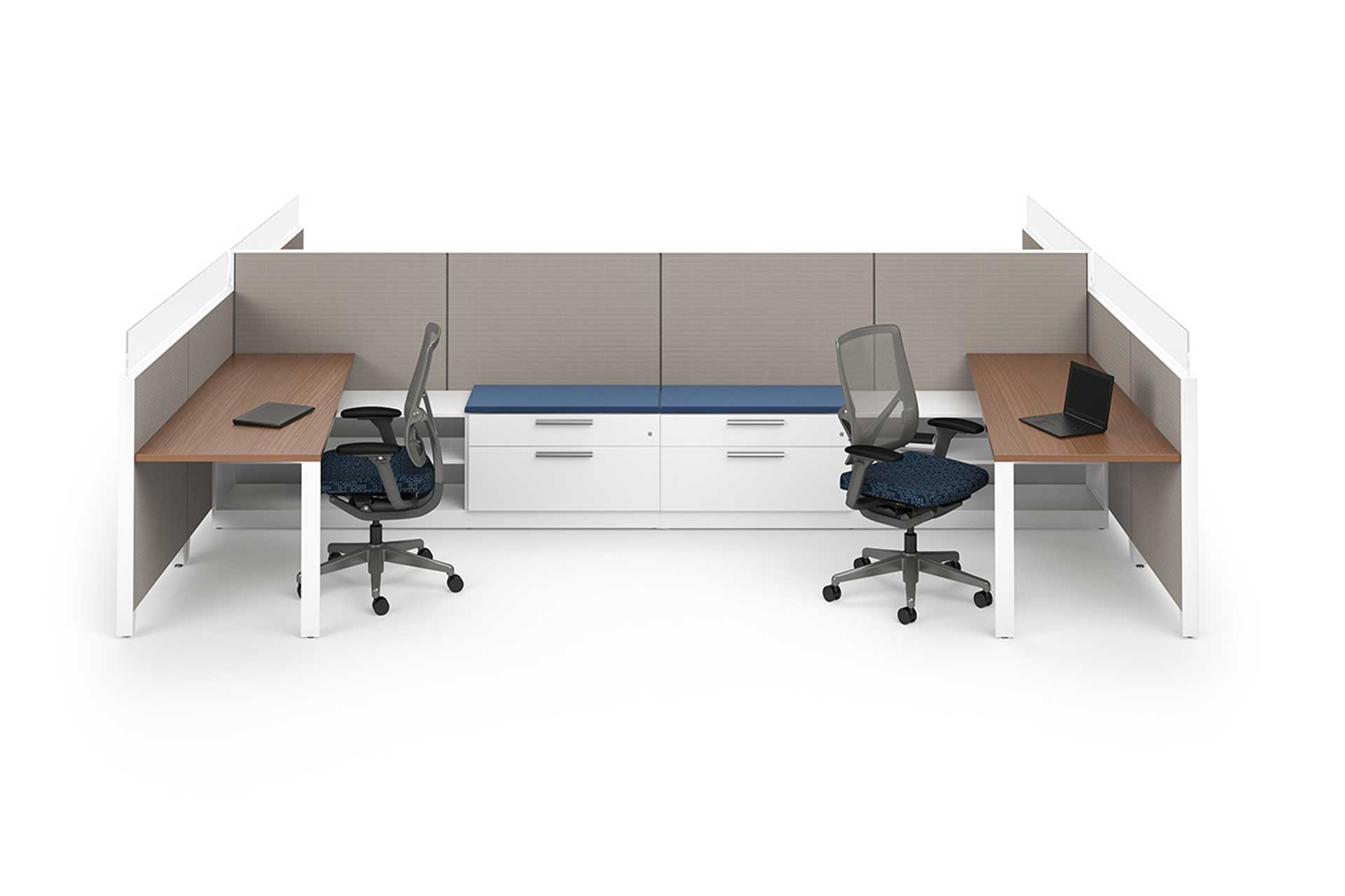 Two office desks back to back with two swivel chairs, desks, cabinets, and dividing walls