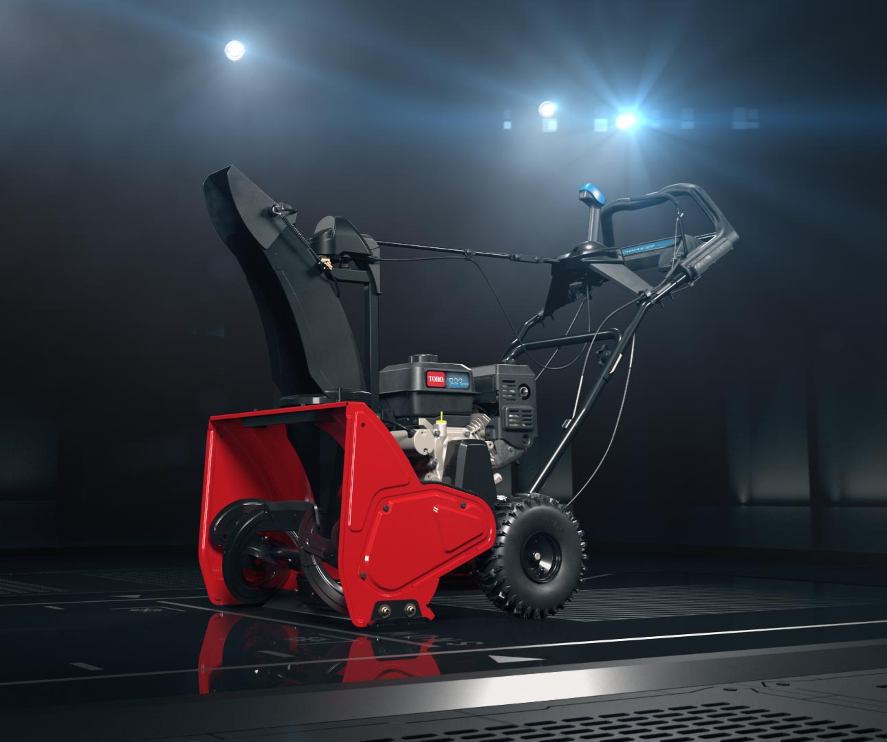 3D animation of a snow blower in front of a black background with spotlights from above