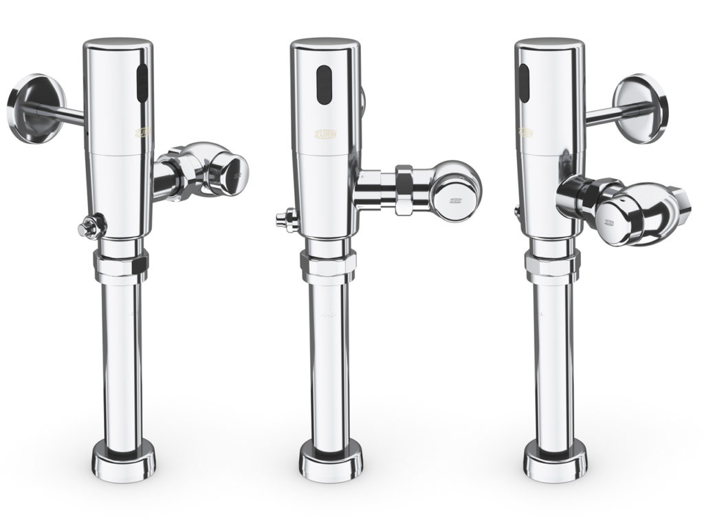 Three chrome-plated sensor flush valves for water closets manufactured by Zurn