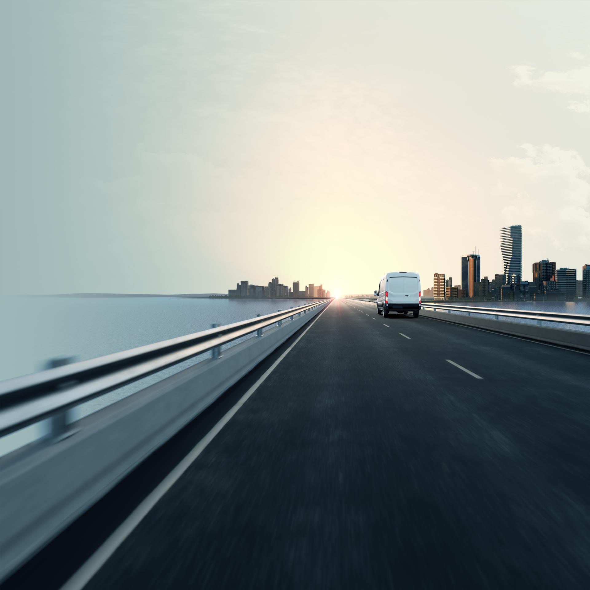 Semi-truck driving down highway toward city in Phillips 66 campaign