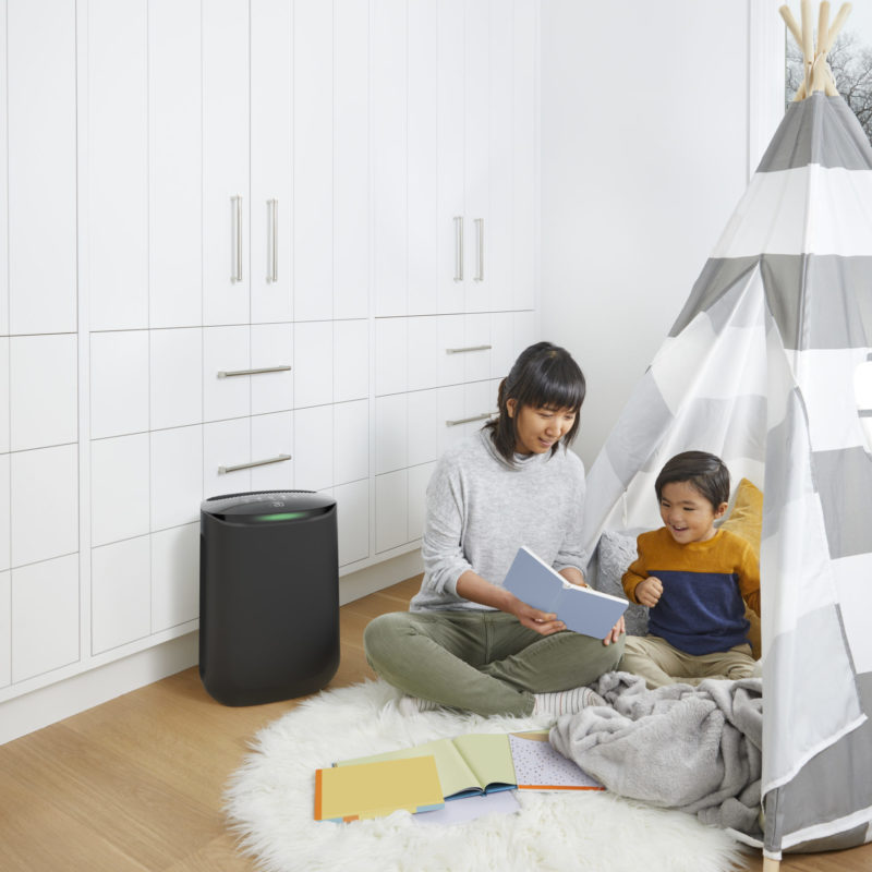 image of mom and son reading in kids bedroom